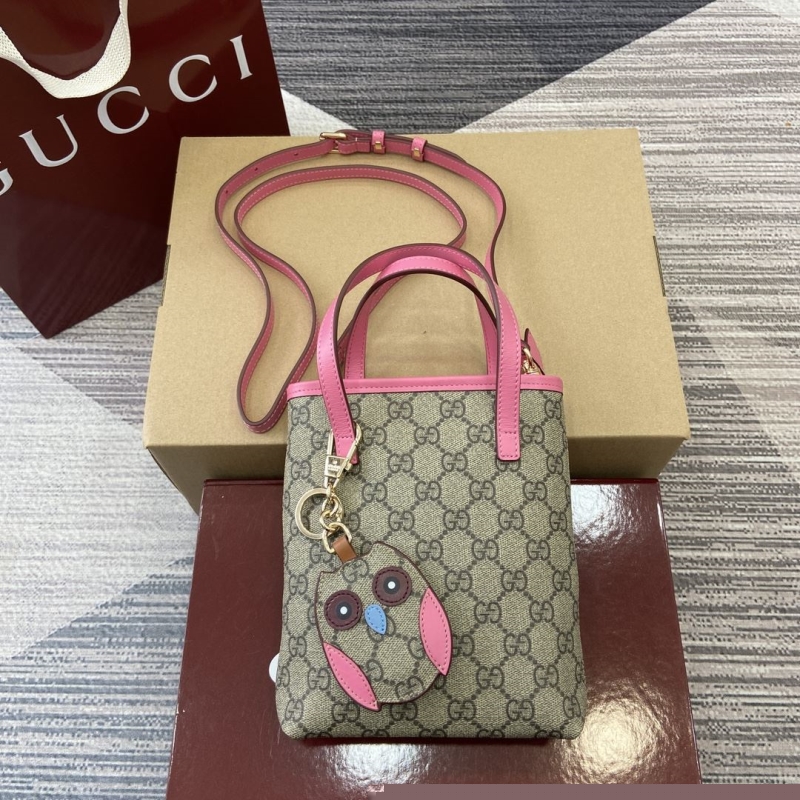 G*u*i top handle bags